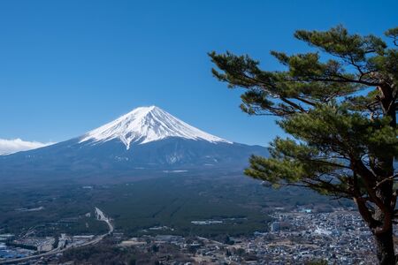 View of Mount Fuji, commonly called Fuji san in Japanese, Mount Fuji's exceptionally symmetrical cone, which is snow capped for about five months a year. It is a well known as the symbol of Japan.の写真素材