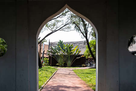 Samut Prakan, Thailand - February16, 2016: View of the Thai old traditional hous of Ancient City or Ancient Siam or Mueang Boran, outdoor park museum featuring replicas historic buildings of Thailand.のeditorial素材