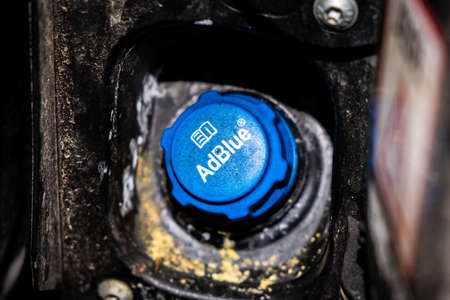 Vienna, Austria - October 7, 2019:  View of AdBlue refill cap on the car, a Diesel exhaust fluid or an aqueous urea solution for combustion of soot and to reduce air pollution to the atmosphere.のeditorial素材