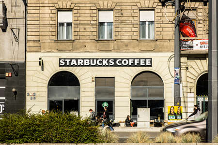 Budapest, Hungary - October  11, 2019: View of Starbucks front store, an American coffee company and coffeehouse chain, nearby Budapest Keleti railway station in Budapest, Hungary.のeditorial素材