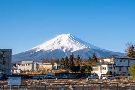 Yamanashi, Japan - March 24, 2019 : View of Mount Fuji, commonly called Fuji san in Japanese, Mount Fuji's exceptionally symmetrical cone, from Mt. Fuji Station in Yamanashi, Japan.のeditorial素材