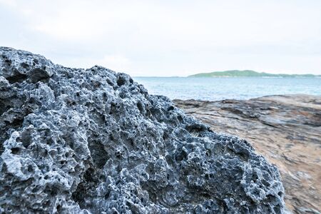 View of the rock beach at Khao Laem YaâMu Ko Samet National Park in the Gulf of Thailand off the coastline of Rayong, Thailandの写真素材