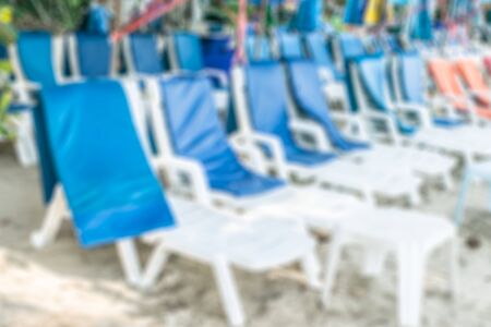 Blurred background of relaxation chair of Pattaya beach, Thailand in the nice holiday in summerの写真素材