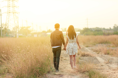 Man and woman walk together happily.の写真素材