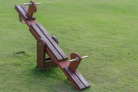 Wooden Teeter totter in public playground