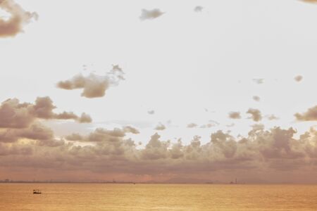 colorful dramatic sky with cloud at sunsetの写真素材