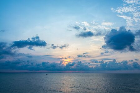 colorful dramatic sky with cloud at sunsetの写真素材