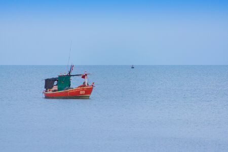 Landscape of fishing boats floating sea at Prachuap Khiri Khan province, Southern of Thailandの写真素材