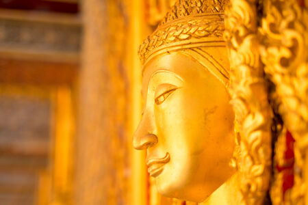 Angel decoration of Buddhist Temple Door in Uthaithani,Thailandの写真素材
