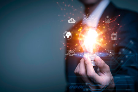 Businessman holding a light bulb, Creative new idea. Innovation, brainstorming, solution and...