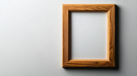 Empty wooden frame with rustic finish on white, ready for artwork or creative design ideasの素材