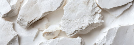 A white rock with a few cracks in it. The cracks are visible and the rock appears to be brokenの素材