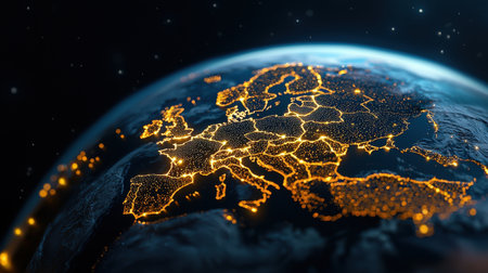 A globe with the word Europe on it. The globe is lit up with a warm orange glowの素材