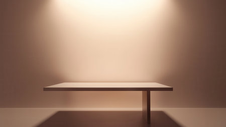 A table is sitting in front of a wall. The table is empty and the wall is whiteの素材