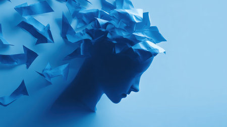 A woman's head is shown in a blue background with paper cutouts of arrows scattered around it. Concept of chaos and disarray, as if the woman's thoughts are scattered and disorganizedの素材
