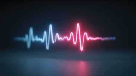 A red and blue wave of sound is shown in the image. The red and blue colors give the impression of a pulsating, energetic sound. Concept of excitement and movement, as if the sound is aliveの素材