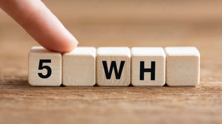 A hand is touching a wooden block with the letters 5, 5, 5, 5, 5, 5, 5, 5, 5, 5, 5, 5, 5, 5, 5, 5, 5, 5, 5, 5,の素材