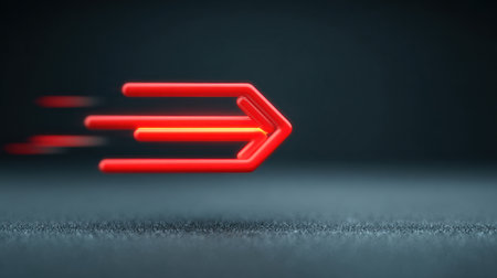 A red arrow is shown in motion, with the tip of the arrow pointing to the right. Concept of speed and movement, as if the arrow is racing towards its destinationの素材