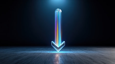 A downward arrow is lit up in a dark room. The arrow is made of glass and is surrounded by a blue light. Concept of movement and direction, as if the arrow is guiding the viewer towards somethingの素材