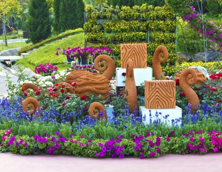 multicolored flowerbed on a lawn. horizontal shot. small GRIPの写真素材