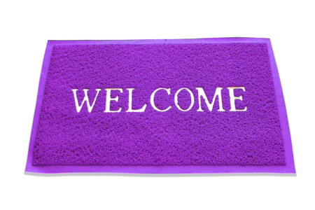 The doormat of welcome text on white backgroundの写真素材