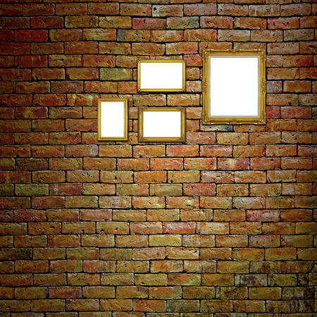 Antique golden frame on brick wallの写真素材