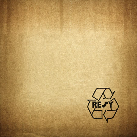 recycle symbol on cardboard textureの写真素材