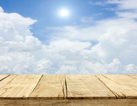 Wood planks floor on blue sky backgroundの写真素材