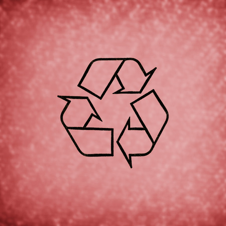 recycled sign on  red  blurred backgroundの写真素材