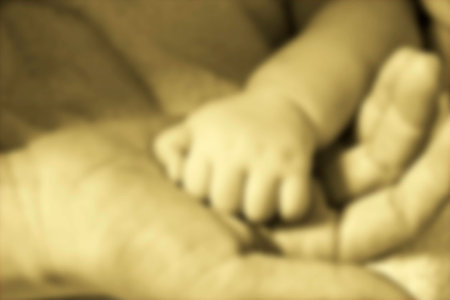 concept of love and family. hands of mother and baby, Concept Blur vintageの写真素材