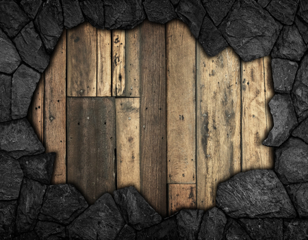 stone wall with hole for backgroundの写真素材