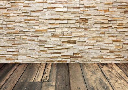wooden floor and stone wall background.