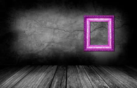 frame on gray stone wall background in interior room.の写真素材