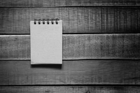 notepaper on wood, stationery office equipment  on wooden background.の写真素材