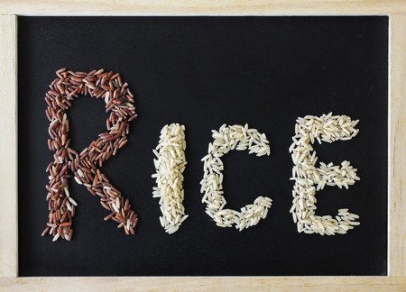rice seed on a blackboard for text.の写真素材