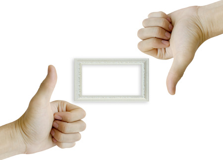 male hand gesturing the ok sign and white frame isolated on white background.の写真素材