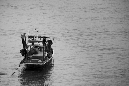 Boat floating in the sea of Thailand,
Black and white conceptionの写真素材