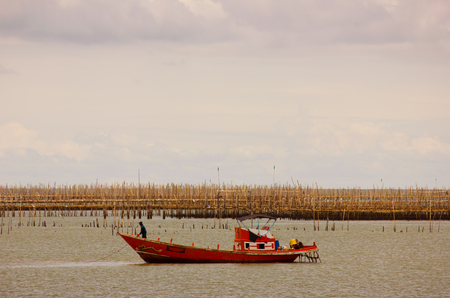 Boat floating in the sea of Thailand.の写真素材