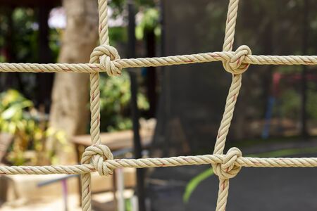 Closeup rope net for children toy in playground.