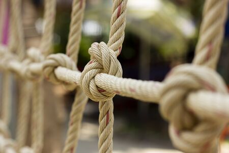 Closeup rope net for children toy in playground.