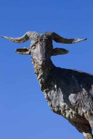 Monument dedicated to Chivo   Goat Breeding   famous for cured meat typical of the area  Cecina de Chivo  in the town of Vegacervera   Amancio Gonzalez sculptor   Province of Leon   Spain の写真素材