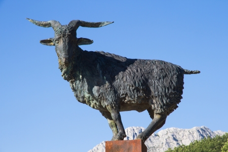 Monument dedicated to Chivo   Goat Breeding   famous for cured meat typical of the area  Cecina de Chivo  in the town of Vegacervera   Amancio Gonzalez sculptor   Province of Leon   Spain の写真素材