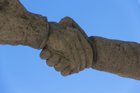 Detail of monument to livestock Bonar Spain   Hand giving himself -  Closing a dealの写真素材