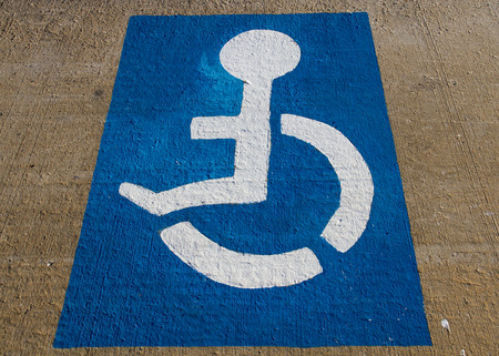 Signal Painted on the floor reserved for disabled parking