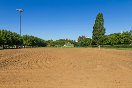 Preparation of land for construction of a football field in public sports areaの写真素材