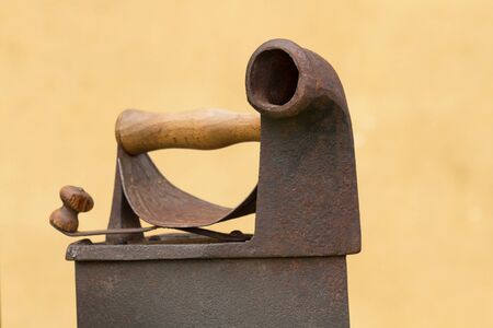 Detail of old iron for ironing clothes coals coalsの写真素材