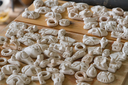 Collection of small pieces of stoneware ceramic workshop ready to paint ceramic Raku technique Withの写真素材