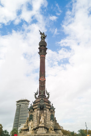 Statue of Columbus in Barcelona and sky background with cloudsのeditorial素材