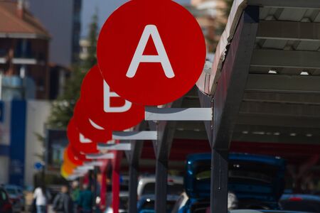 Car parking sorted by alphabet lettersの写真素材