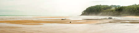 Panorama of flat beach with strut in the Cantabrico Sea, North of Spain. Asturias. Spainの写真素材